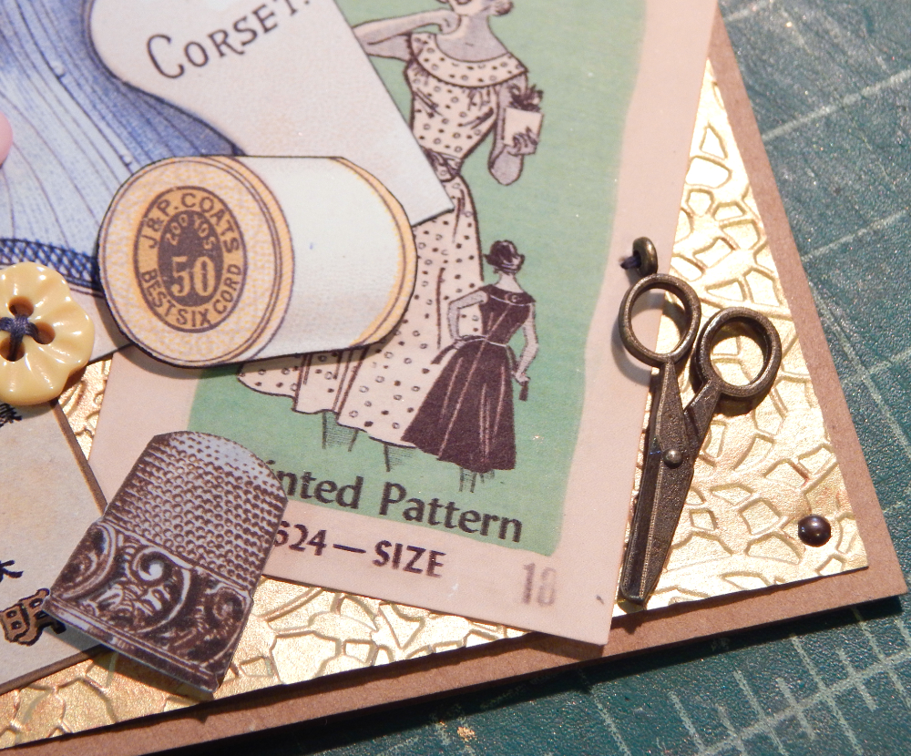 Detail of scissors charm and sewing images