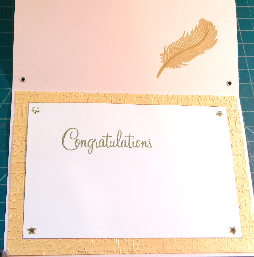 Interior of card with congratulations stamp.