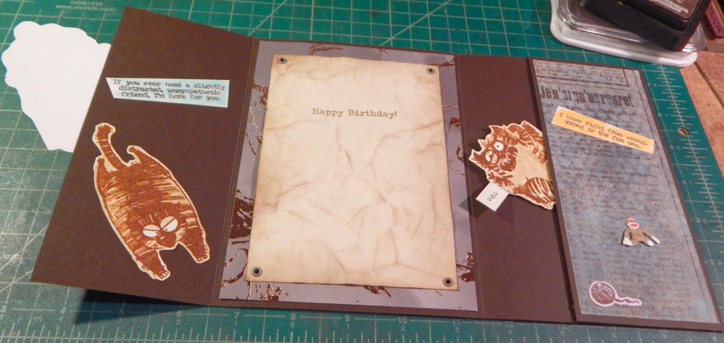 Fully open card with pop out cat